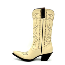 Load image into Gallery viewer, Women's handmade bone color cowhide leather cowboy boots. Chocolate stitch on tube and vamp. Chocolate leather pull-straps. Vintage style toe medallion. 12" height. Tan leather lining. Snip toe. 2 3/4" fashion heel. Teak leather sole.
