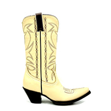 Load image into Gallery viewer, Women's handmade bone color cowhide leather cowboy boots. Chocolate stitch on tube and vamp. Chocolate leather pull-straps. Vintage style toe medallion. 12" height. Tan leather lining. Snip toe. 2 3/4" fashion heel. Teak leather sole.