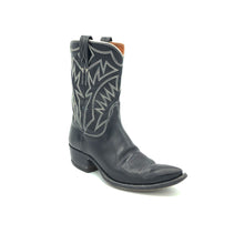 Load image into Gallery viewer, Authentic custom women&#39;s cowboy boots from the 1960&#39;s. Black cowhide leather with white stitch. Traditional western toe medallion. 10&quot; height. 1 1/2&quot; heel. Pointed toe. Black leather sole. These one-of-a-kind cowboy boots were handmade in Texas. Proudly made in the USA.
