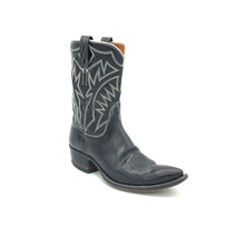 Load image into Gallery viewer, Authentic custom women's cowboy boots from the 1960's. Black cowhide leather with white stitch. Traditional western toe medallion. 10" height. 1 1/2" heel. Pointed toe. Black leather sole. These one-of-a-kind cowboy boots were handmade in Texas. Proudly made in the USA.