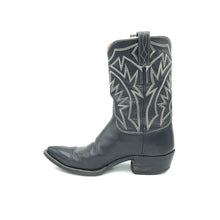 Load image into Gallery viewer, Authentic custom women's cowboy boots from the 1960's. Black cowhide leather with white stitch. Traditional western toe medallion. 10" height. 1 1/2" heel. Pointed toe. Black leather sole. These one-of-a-kind cowboy boots were handmade in Texas. Proudly made in the USA.