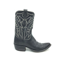 Load image into Gallery viewer, Authentic custom women's cowboy boots from the 1960's. Black cowhide leather with white stitch. Traditional western toe medallion. 10" height. 1 1/2" heel. Pointed toe. Black leather sole. These one-of-a-kind cowboy boots were handmade in Texas. Proudly made in the USA.