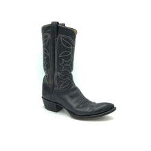 Load image into Gallery viewer, Authentic custom women's cowboy boots from the 1970's. Black cowhide leather with white stitch. Traditional western toe medallion. 11" height. 1 1/2" heel. Pointed toe. Black sole. These one-of-a-kind Tony Lama's were handmade in El Paso, Texas. Proudly made in the USA.