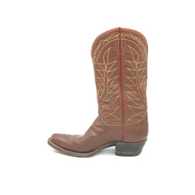 Load image into Gallery viewer, Authentic custom women's cowboy boots from the 1950's. Brown cowhide leather with tan stitch and red piping. Traditional western toe medallion. Inside cloth pull-straps. 12" height. 1 1/2" heel. Snip toe. Brown sole. These one-of-a-kind Tony Lama cowboy boots were handmade in El Paso, Texas. Proudly made in the USA.