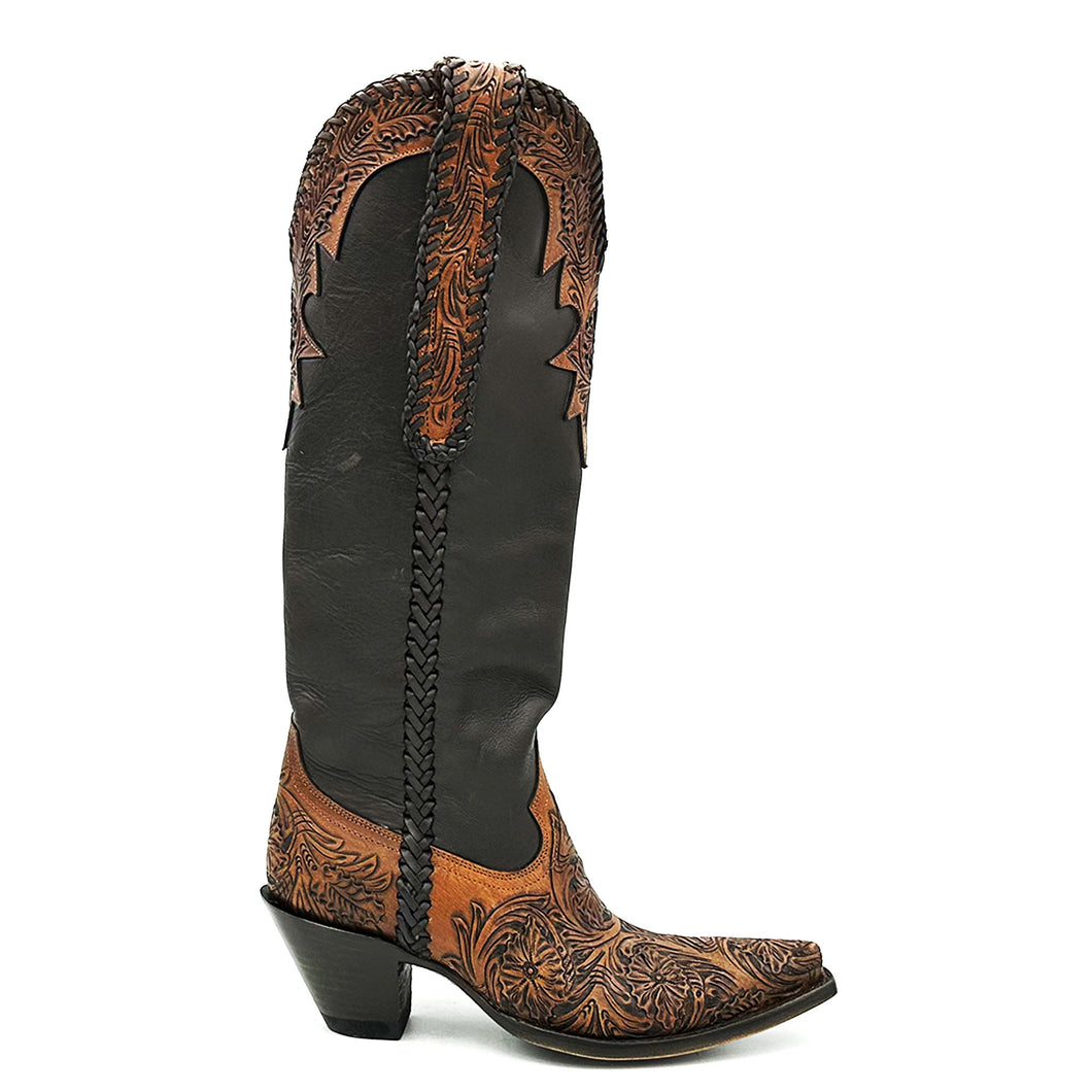 Boot Star Alejandra Western is a women's handmade hand-tooled cowboy boot. Brown floral pattern hand-tooled vamp. Supple deer tanned chocolate brown leather shaft. Extra long hand-tooled pull-straps. Brown braided collar, pull-straps and side seams. 18