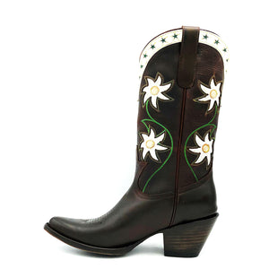 Women's chocolate oiled cowhide leather cowboy boots. 1960's vintage inspired design with green and tan stitching and white floral inlays on the shaft. White collar with green star inlays. Round toe with a classic western toe medallion and a 3" fashion heel.