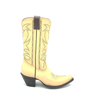 Women's handmade bone color cowhide leather cowboy boots. Chocolate stitch on tube and vamp. Chocolate leather pull-straps. Vintage style toe medallion. 12" height. Tan leather lining. Snip toe. 2 3/4" fashion heel. Teak leather sole.