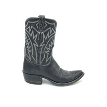Load image into Gallery viewer, Authentic custom women&#39;s cowboy boots from the 1960&#39;s. Black cowhide leather with white stitch. Traditional western toe medallion. 10&quot; height. 1 1/2&quot; heel. Pointed toe. Black leather sole. These one-of-a-kind cowboy boots were handmade in Texas. Proudly made in the USA.
