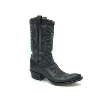 Load image into Gallery viewer, Authentic custom women&#39;s cowboy boots from the 1970&#39;s. Black cowhide leather with white stitch. Traditional western toe medallion. 11&quot; height. 1 1/2&quot; heel. Pointed toe. Black sole. These one-of-a-kind Tony Lama&#39;s were handmade in El Paso, Texas. Proudly made in the USA.
