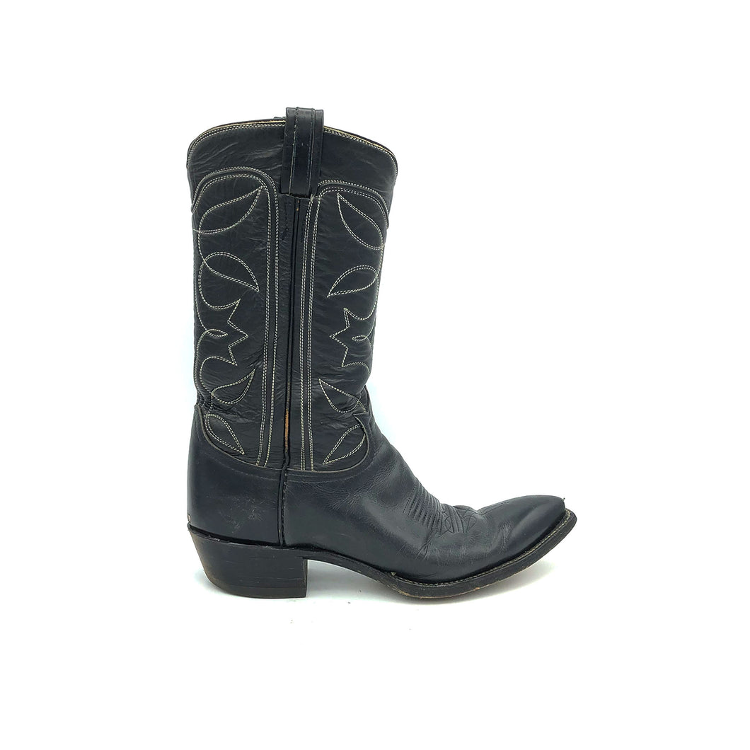 Authentic custom women's cowboy boots from the 1970's. Black cowhide leather with white stitch. Traditional western toe medallion. 11